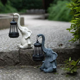 Grey Meditating Elephant Solar Lantern – Decorative Garden Light for Outdoors